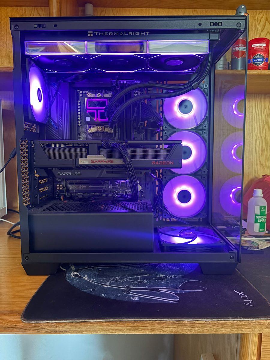 Black build with a 360mm AIO and Radeon graphics card